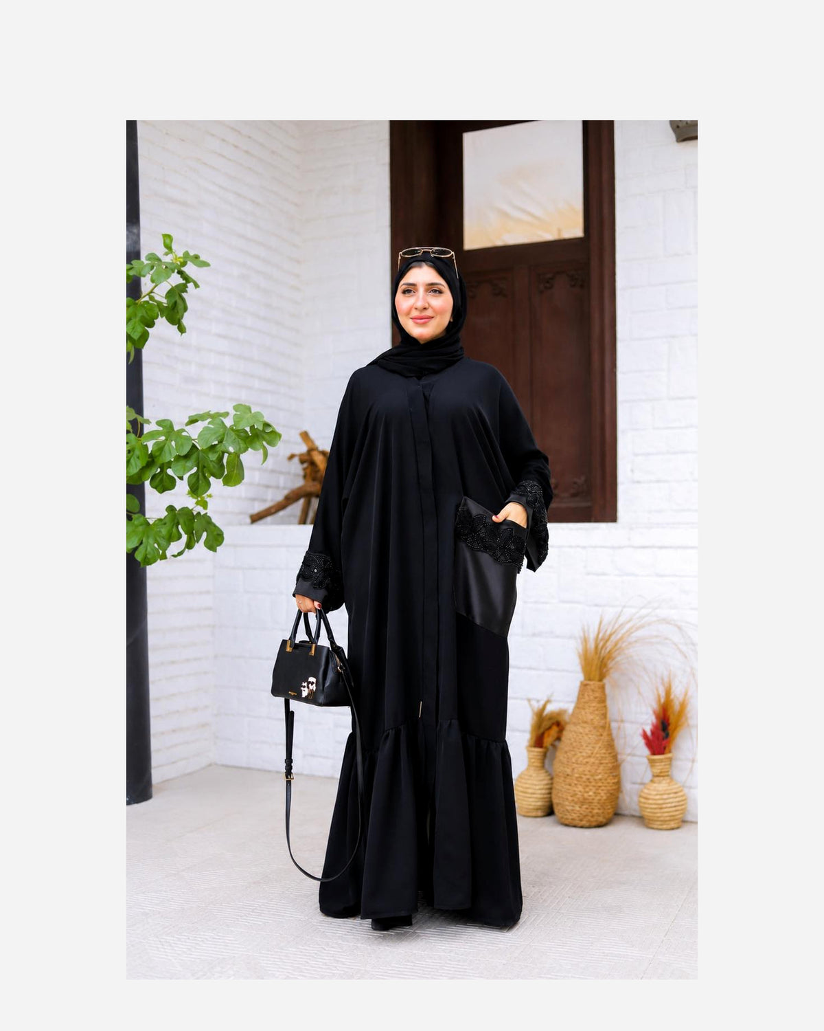 Luxury silk abaya with an elegant and flowing design.