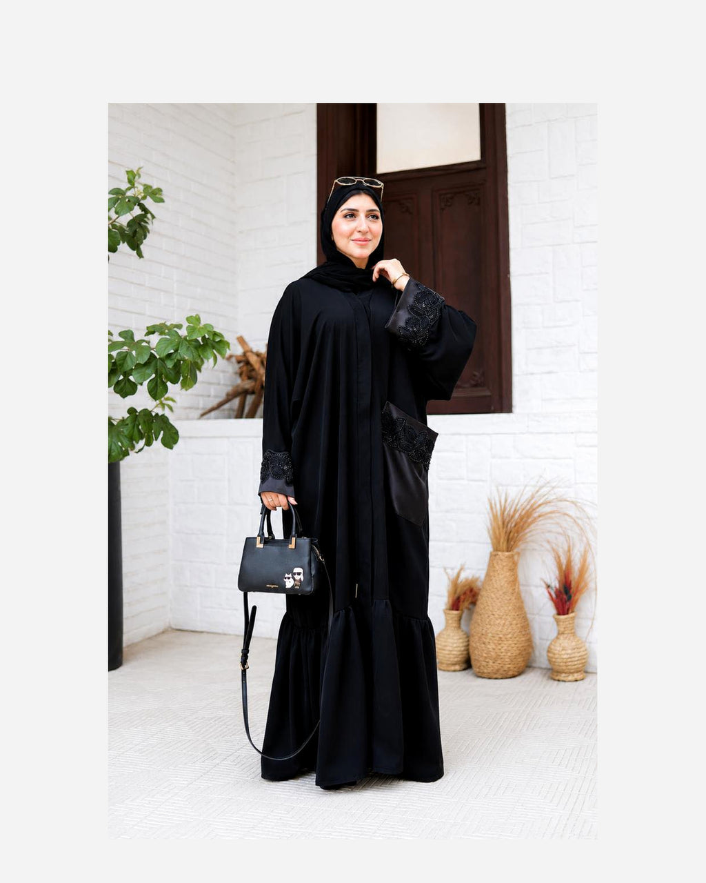 Luxury silk abaya with an elegant and flowing design.