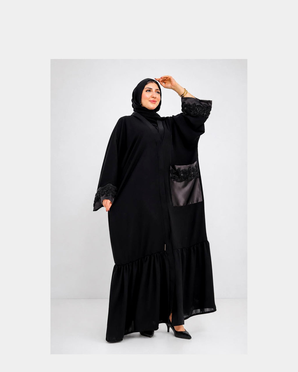 Luxury silk abaya with an elegant and flowing design.