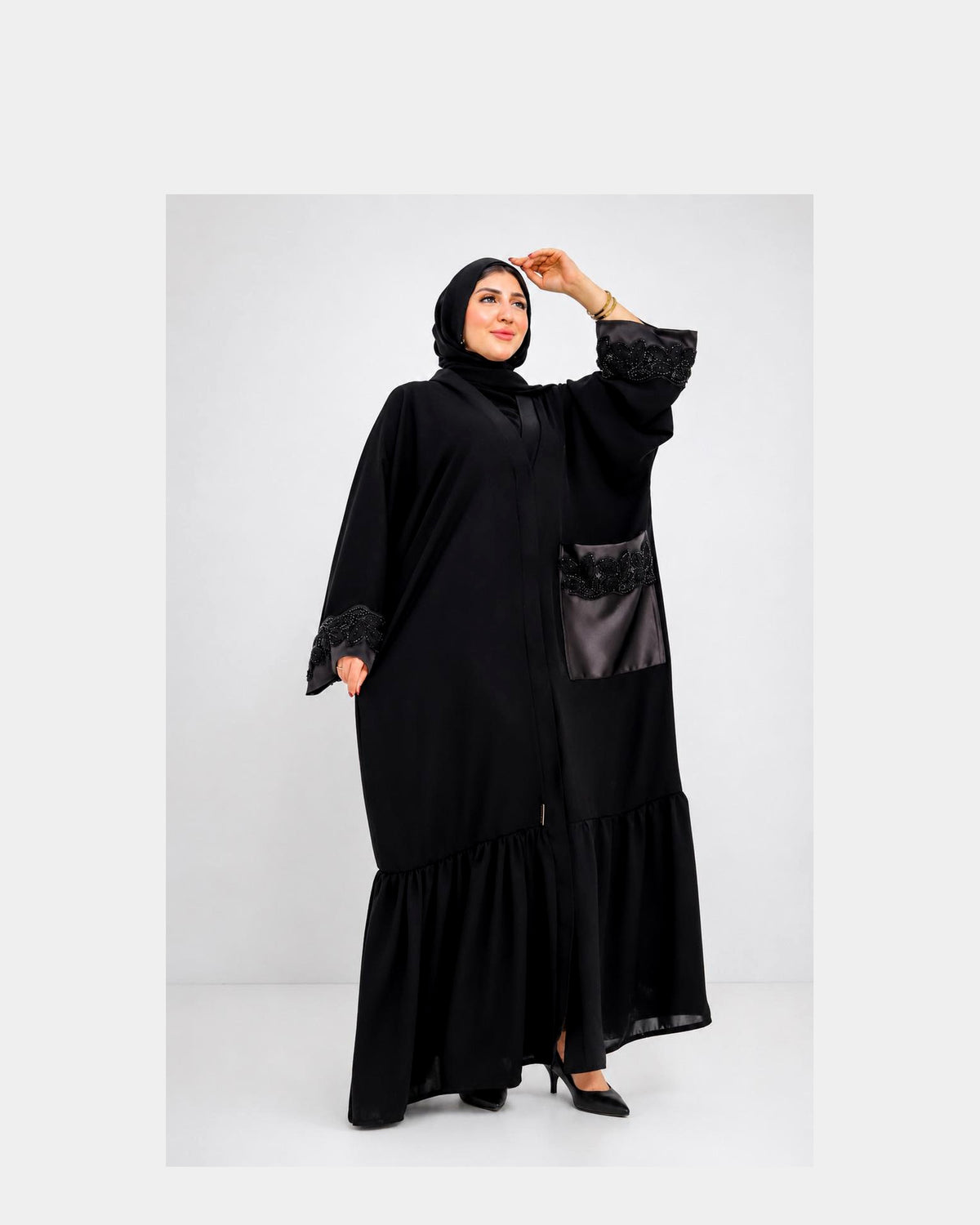 Luxury silk abaya with an elegant and flowing design.